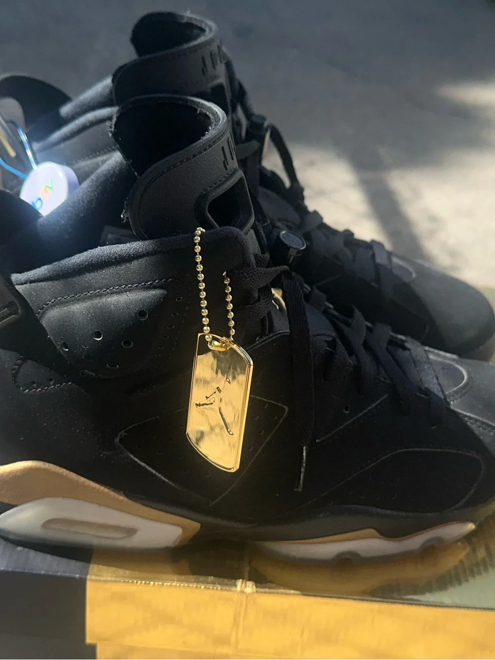 Jordan Men’s Black and Metallic Gold Sneakers